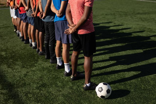 Football Team Training on Sunny Sports Field - Download Free Stock Images Pikwizard.com