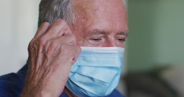 Senior Man Wearing Face Mask in Indoor Environment - Download Free Stock Images Pikwizard.com