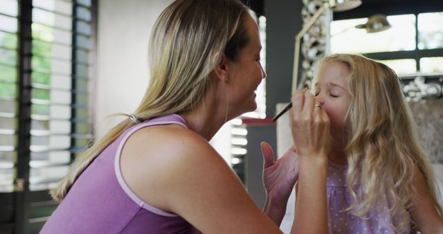 Mother Applying Makeup to Daughter in Bright Living Room - Download Free Stock Images Pikwizard.com