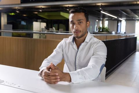 Business Professional in Modern Open Office Setting