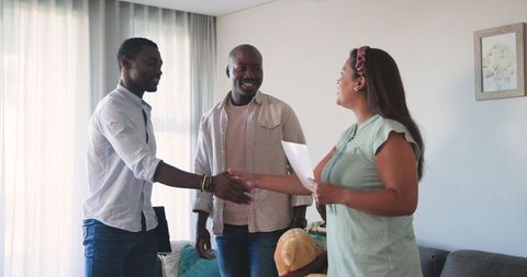 Family Cheerfully Indoors and Embracing Diversity at Home