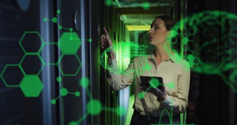 Businesswoman Monitoring Digital Interfaces in Server Room - Download Free Stock Images Pikwizard.com