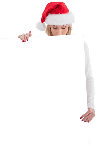 Festive Woman in Santa Hat Holding Transparent Signboard - Download Free Stock Videos Pikwizard.com