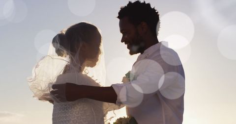 Newlywed Couple Embracing Ocean Sunset Beach - Download Free Stock Images Pikwizard.com