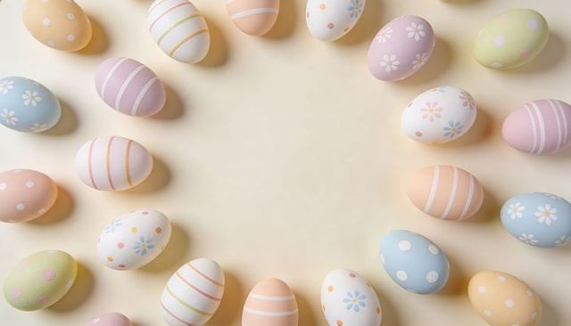 Pastel easter eggs forming circular frame with central copy space on beige backdrop