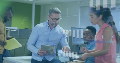 Diverse Team Collaborating with Digital Financial Data - Download Free Stock Images Pikwizard.com