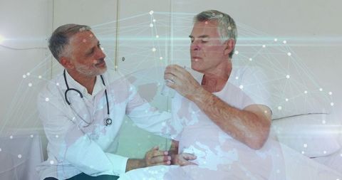 Doctor Consulting Interacting with Patient in Hospital Bed