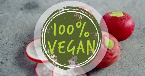100% Vegan Label with Fresh Red Radishes Background