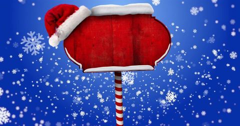 Festive Wooden Sign with Snowflakes on Blue Background