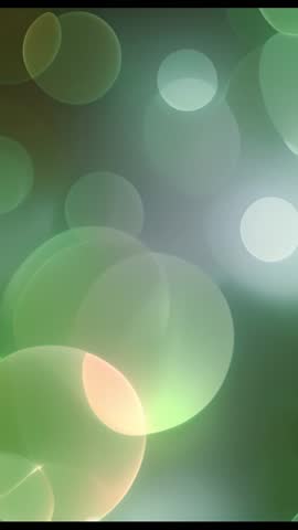 Vertical bokeh animation with drifting pulsing circles over muted green gradient for intros
