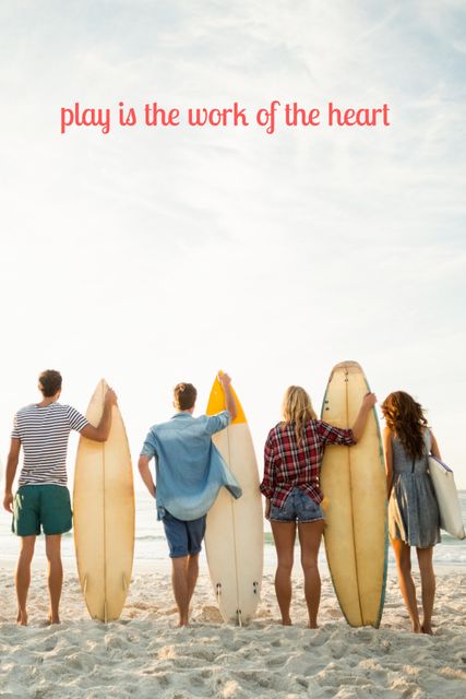 Group of friends standing on beach holding surfboards, showcasing a sense of adventure and camaraderie during sunset. Ideal for use in advertisements for summer vacations, beach outings, surfing lessons, travel agencies, and lifestyle blogs celebrating friendship and outdoor activities.