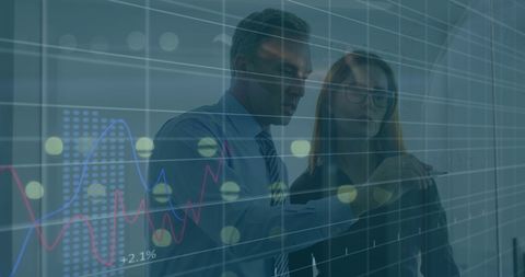 Business Professionals Analyzing Data on Transparent Board in Office - Download Free Stock Images Pikwizard.com
