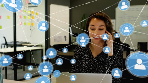 Businesswoman Connecting Digitally in Modern Office with Networking Icons