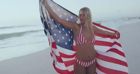 Celebrating Freedom with American Flag on Sandy Beach - Download Free Stock Images Pikwizard.com