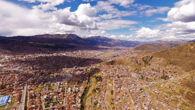 Aerial View of Historic Peruvian City Surrounded by Andes Mountains - Download Free Stock Images Pikwizard.com