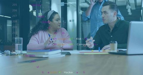 Collaborating Team Discussing Cybersecurity Strategy with Code Overlay at Conference Table