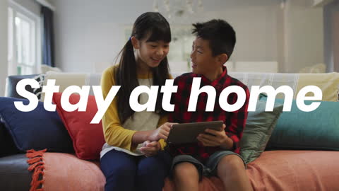 Children Using Tablet Together at Home for Family Bonding