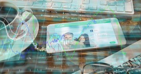 Smartphone displaying couple profile blending with stock charts on wooden desk, dating