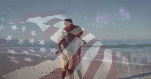 Couple walking on beach with american flag overlay celebrating romance and patriotism