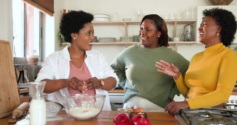 African American Friends Cooking Together at Home
