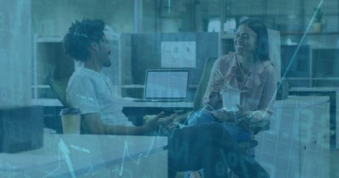 Professionals Collaborating in Open-Plan Office With Technology