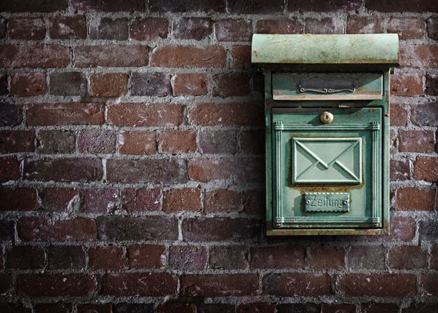 Vintage Green Mailbox on Red Brick Wall - Download Free Stock Photos Pikwizard.com