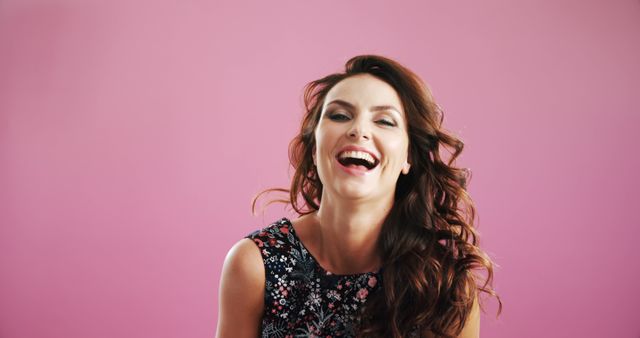 Woman Laughing Joyfully Against Pink Background - Download Free Stock Images Pikwizard.com