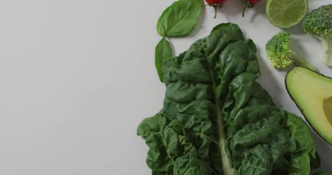 Fresh Green Leafy Vegetables and Fruits on White Background - Download Free Stock Images Pikwizard.com