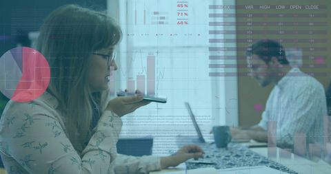 Collaborative Colleagues Analyzing Financial Data in Modern Office