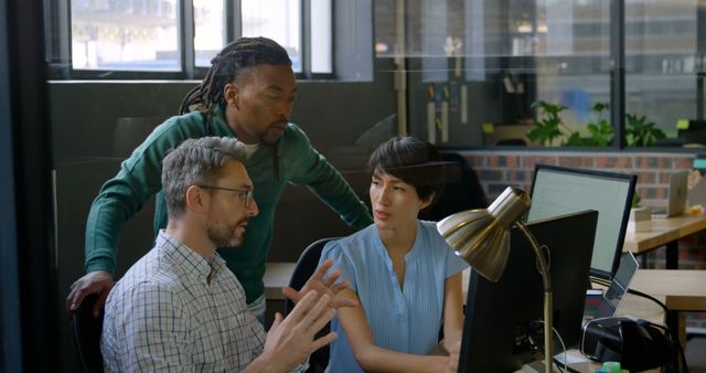 Business Team Collaborating on Computer in Modern Office Environment - Download Free Stock Photos Pikwizard.com