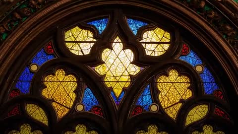 Intricately Designed Stained Glass Window in Old Chapel