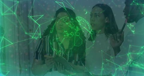 Team Analyzing Digital Network with Futuristic Globe Projection