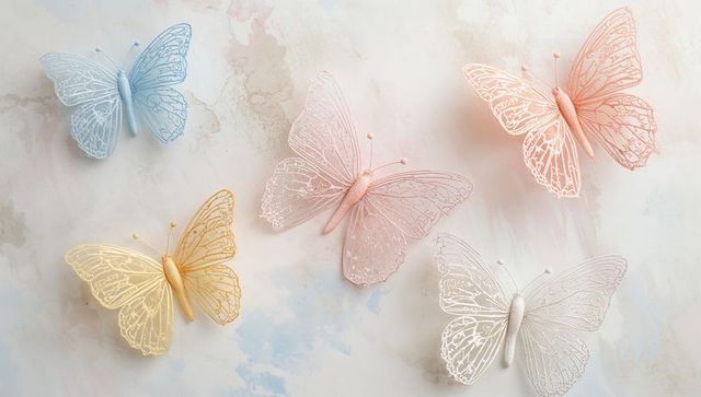 Pastel lace butterfly wall ornaments casting soft shadows for nursery and wedding decor