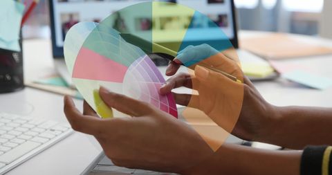 Businesswoman Analyzing Color Wheel for Creative Project - Download Free Stock Images Pikwizard.com