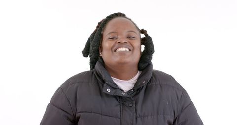 Woman Smiling Warmly in Winter Jacket