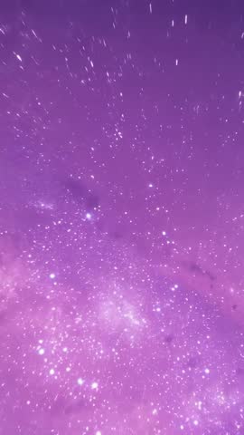 Vertical video panning upward over purple Milky Way cluster and glowing moon orb