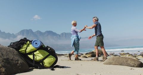 Senior Couple Dancing on Beach Adventure Vibes