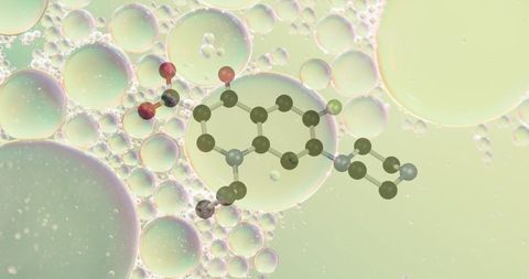 Chemical Structure Overlay on Fluid Bubbles with Abstract Green Background - Download Free Stock Images Pikwizard.com