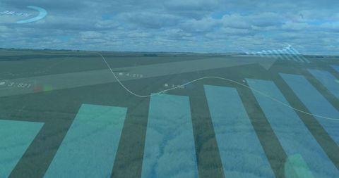 Agricultural data analytics visuals overlooking expansive crop field