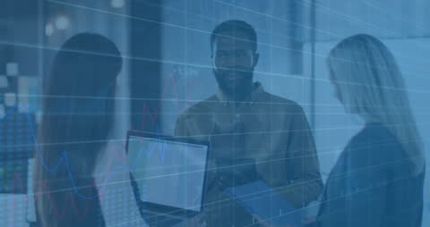 Diverse Team Engaged with Financial Data Analysis in Modern Office