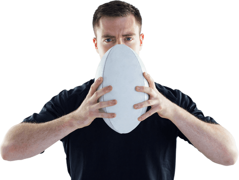 Rugby player holding rugby ball with determination transparent background