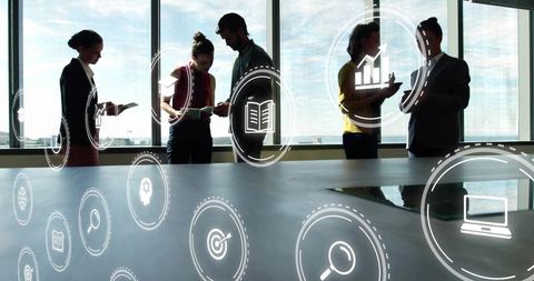 Business Professionals Collaborating with Digital Interfaces