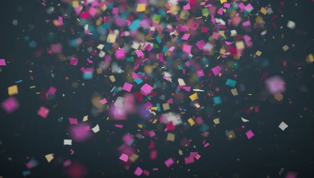 Colorful Confetti Squares Floating Against Dark Background