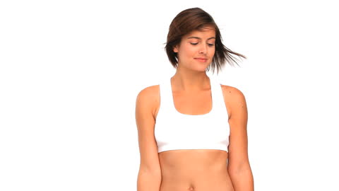 Active Woman in Sportswear Exercising with Dumbbells Against White Background