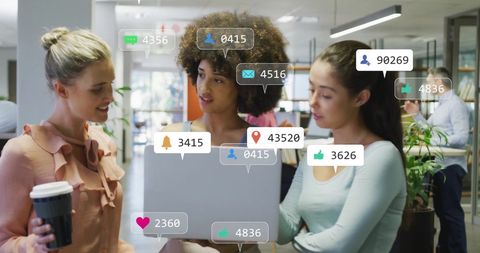 Diverse businesswomen discussing with social metrics overlay