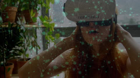 Woman Immersed in Virtual Reality Experience Overlaid with Digital Connections