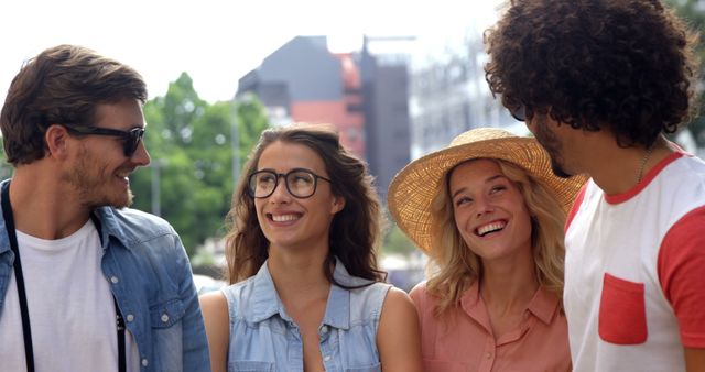 Group of Friends Laughing Together Outdoors on Sunny Day - Download Free Stock Images Pikwizard.com