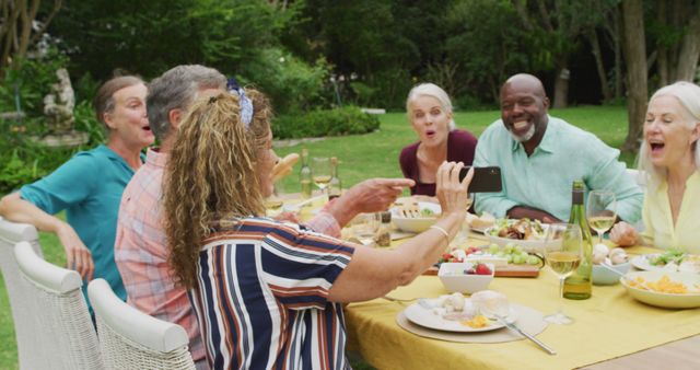 Senior Friends Enjoying Outdoor Dinner Taking Selfie - Download Free Stock Images Pikwizard.com