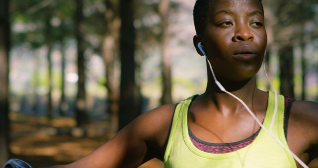 Focused African American Woman Exercising Outdoors in the Forest - Download Free Stock Images Pikwizard.com