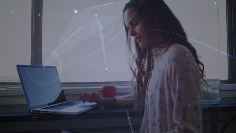 Caucasian Woman Engaging in Global Networking with Laptop at Office